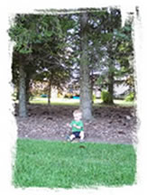 Ty in front of trees